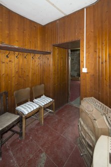 Ground Floor General view of Back Lobby showing panelling and stoves.