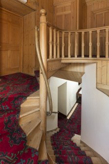 Second Floor General view of top of staircase leading to the library.