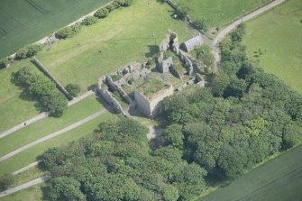 Oblique aerial view of Pitsligo Castle, looking NNE.