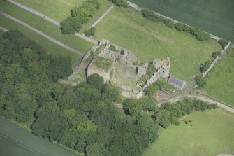 Oblique aerial view of Pitsligo Castle, looking NNW.