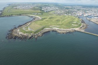 Oblique aerial view of Girdleness Lighhouse and Balngask Golf Course, looking WSW.