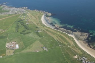 Oblique aerial view of Inverallochy Golf Course, looking NNE.