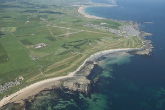 Oblique aerial view of Inverallochy and Inverallochy Golf Course, looking W.