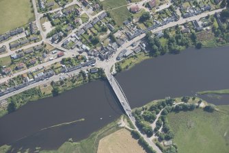 Oblique aerial view of the road bridge at Bonar Bridge, looking E