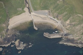 Oblique aerial view of Latheronwheel Harbour, looking NW.