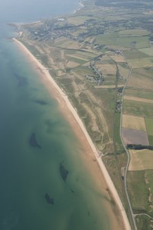 Oblique aerial view of Brora Golf Course, looking SW.