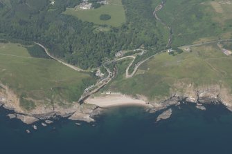 Oblique aerial view of Berriedale Village and harbour and Berriedale Braes, looking NW.