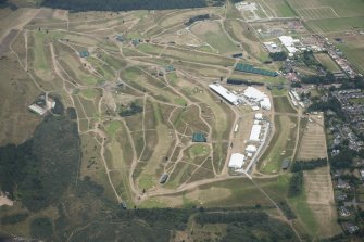 oblique aerial view of Muirfield golf course showing the set up for the Open Championship 2013, looking E.