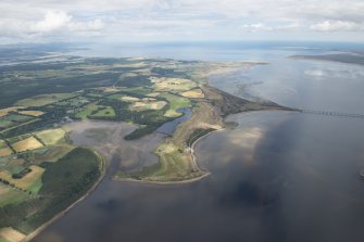 General oblique aerial view with Poll na Caorach in the foreground and Dornoch Firth beyond, looking E.