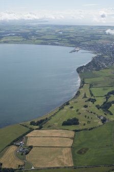 General oblique aerial view of Stranraer Golf Course with the town beyond, looking SE.