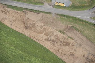 Oblique aerial view during excavation.