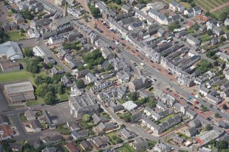 Oblique aerial view of Biggar centred on the Corn Exchange, looking WNW.