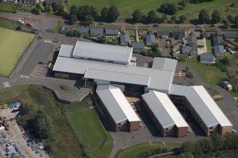Oblique aerial view of Biggar High School, looking ENE.
