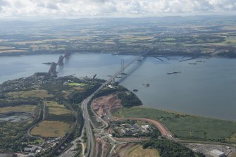 General oblique aerial view of the Queensferry Crossing under construction, looking SE.
