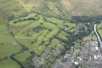 General oblique aerial view of Langholm and the golf course, looking SE.