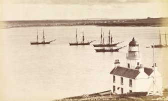 View of lighthouse and five sailing ships.
Titled: 'Scrabster Lighthouse and bay, Thurso. 2106 G.W.W.'
PHOTOGRAPH ALBUM No.33: COURTAULD ALBUM.