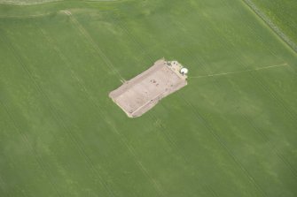Oblique aerial view centred on the Glasgow University excavations at Leadketty, looking SE.