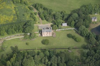 Oblique aerial view of Druminnor Castle and garden, looking to the NNW.