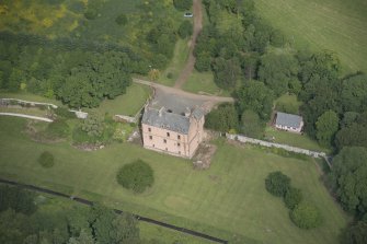 Oblique aerial view of Druminnor Castle and garden, looking to the NW.