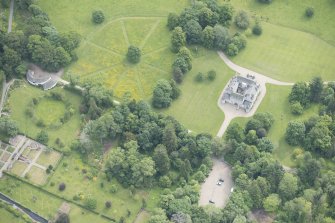 Oblique aerial view of Leith Hall and policies, looking to the E.