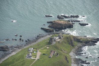 Oblique aerial view of Old Slains Castle, looking to the E.