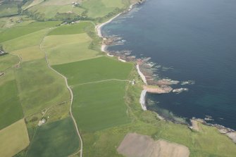 Oblique aerial view of Dundarg Castle, looking to the W.