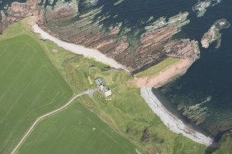 Oblique aerial view of Dundarg Castle, looking to the NW.