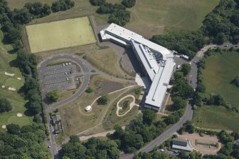 Oblique aerial view of Holyrood Secondary School, looking SSE.