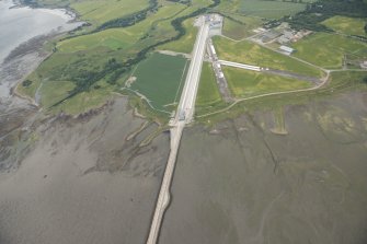 Oblique aerial view of Evanton airfield, looking WSW.