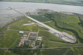 Oblique aerial view of Evanton airfield, looking SSE.