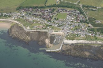 General oblique aerial view of Balintore, looking NW.