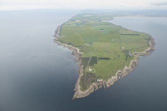 General oblique aerial view of Tarbat Ness with Portmahomack beyond, looking SW.