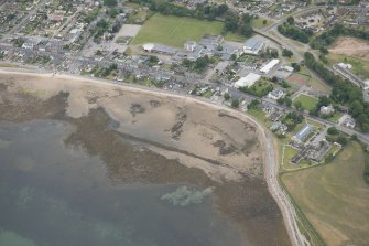 Oblique aerial view of a fish trap at Golspie, looking NW.