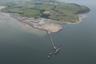 General oblique aerial view of Nigg fabrication yard and oil terminal, looking ENE.