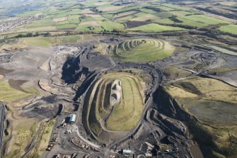 General oblique aerial view of St Ninian's Open Cast Mine, centred on the Sculptured Landscape by Charles Jenks, taken in 2013.