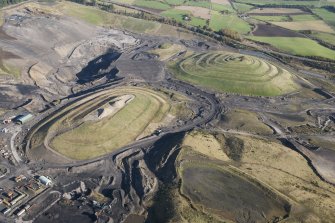 General oblique aerial view of St Ninian's Open Cast Mine, centred on the Sculptured Landscape by Charles Jenks,  looking to the NNE.