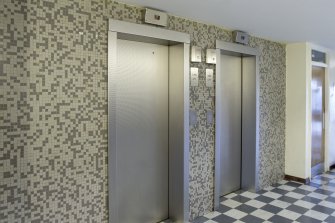 Graham House, ground floor, entrance hall, view of lifts