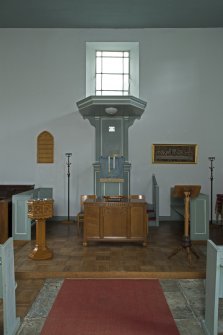 View of chancel with font, pulpit and lectern