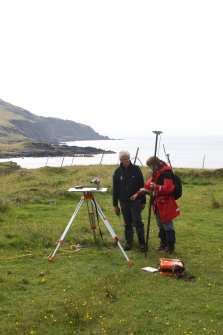 Setting up the GPS at Harris, Rum. Mr Ian Parker and Mrs Angela Gannon in shot.