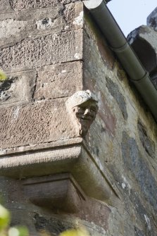 Detail of head on east corner.