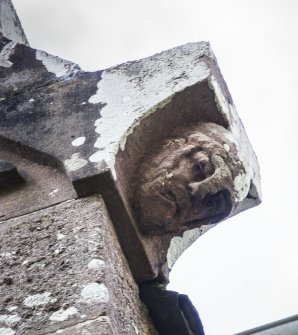 Detail of head on roof corbel.