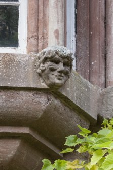 Detail of head on oriel window.