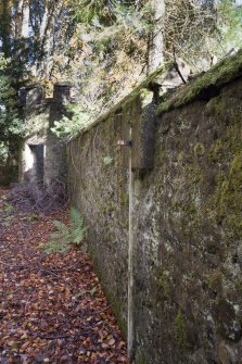 General view of North West wall showing gate post in wall.