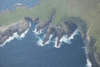 Oblique aerial view of Fianuis, North Rona, looking to the ESE.