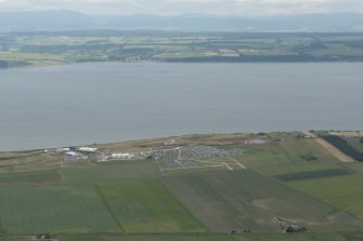General oblique aerial view centred on Castle Stuart Golf Course with Avoch beyond, looking NW.