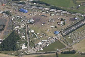 Oblique aerial view of the T in the Park festival at Balado, looking SSE.