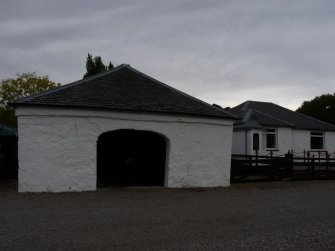 Corpach Storehouse/stable from front showing arched door