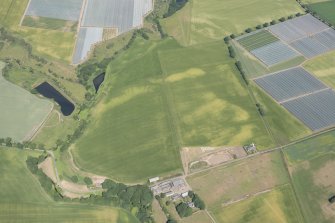 Oblique aerial view of the cropmarks at Craigmill, looking WNW.