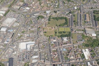 Oblique aerial view centred on Arbroath Abbey, looking NNW.