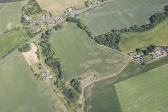 Oblique aerial view of cropmarks of the policies around Rossie Castle, looking N.